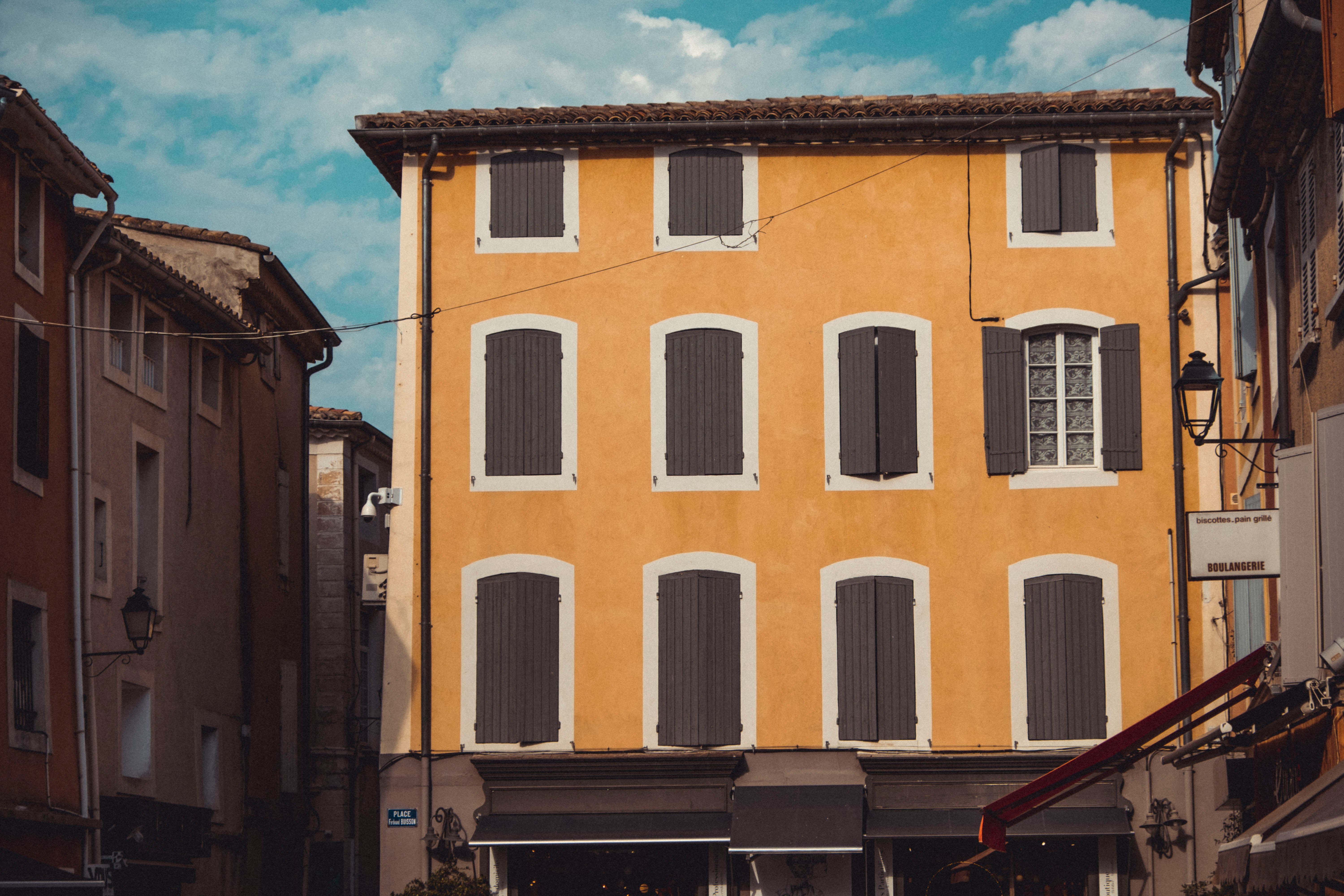 yellow and white concrete building during daytime